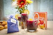 Sangria - which is great slushy but also great warm out of the crock pot w/3 slices of orange & 1 cinnamon stick